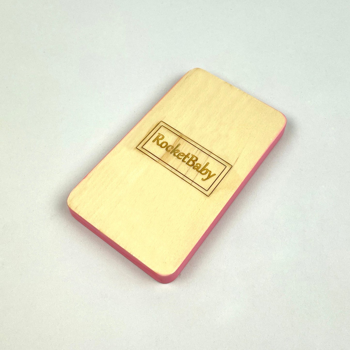 Giocattolo mobile in legno RocketPhone rosa