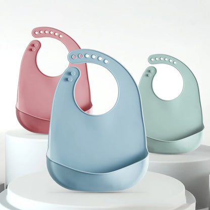 Bavaglino in silicone per neonati con tasca multivariante