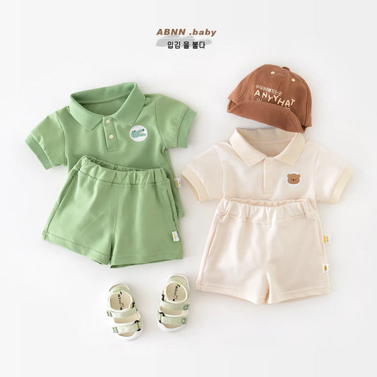 Set 2 pezzi polo e pantaloncini in cotone per bambini Multi-variante