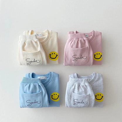 Set tuta in cotone per bambini Smile multicolore
 Set Pantaloni e Felpa con Multivariante Smile