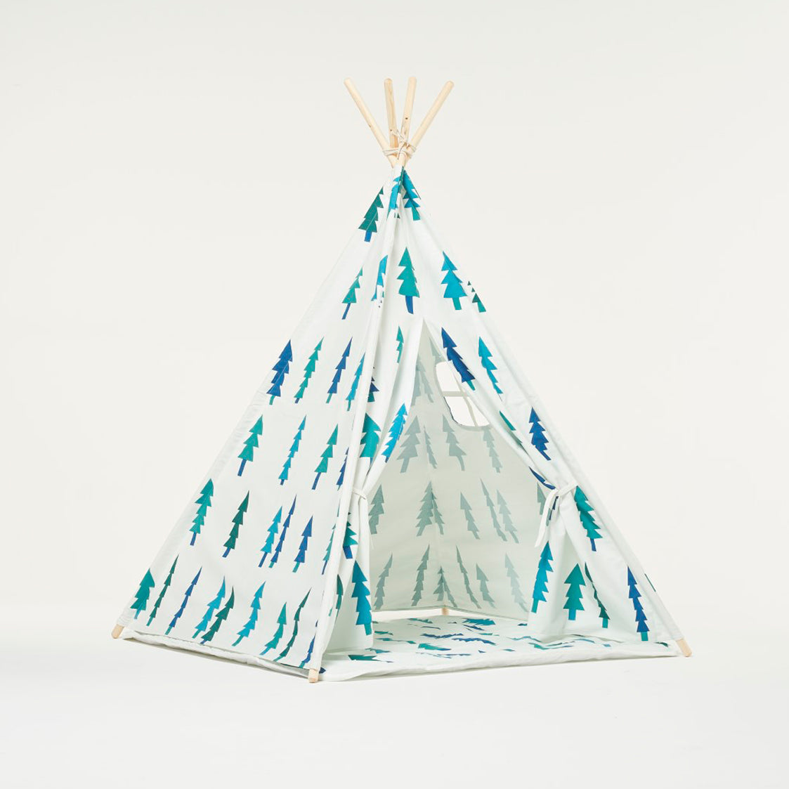 Tienda de juegos tipi blanca con árboles y cojín
